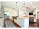 Spacious kitchen with a large island, granite countertops, stainless steel appliances, and ample storage at 114 Wingard Rd, Concord, NC 28025