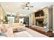 Inviting living room featuring a stone fireplace, wood floors, and an open floor plan at 114 Wingard Rd, Concord, NC 28025