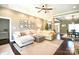 Spacious living room with hardwood floors, ceiling fan, and inviting seating area at 114 Wingard Rd, Concord, NC 28025