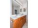 Bright bathroom with double sinks, vanity and a large mirror at 11863 Ridgeway Park Dr, Charlotte, NC 28277
