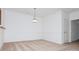 Inviting dining room with neutral carpet and modern hanging light fixture at 11863 Ridgeway Park Dr, Charlotte, NC 28277