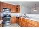 Kitchen featuring stainless steel appliances, and light colored cabinetry at 11863 Ridgeway Park Dr, Charlotte, NC 28277