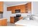 Cozy kitchen featuring stainless steel appliances and light cabinetry at 11863 Ridgeway Park Dr, Charlotte, NC 28277