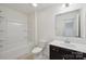 Bathroom features a bathtub, neutral walls, and a vanity at 120 Mooring Dr, Statesville, NC 28677