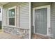 Charming front door with stone accents and a welcoming entryway at 120 Mooring Dr, Statesville, NC 28677