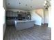 Modern kitchen with stainless steel appliances, gray cabinetry, and a large island at 120 Mooring Dr, Statesville, NC 28677