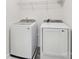 This laundry room includes a washer and dryer at 120 Mooring Dr, Statesville, NC 28677