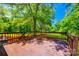 Back porch with a large tree providing ample shade at 1224 Martin Rd, Hickory Grove, SC 29717