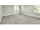 Inviting bedroom featuring updated flooring and trim, neutral walls, and an ample closet at 1224 Martin Rd, Hickory Grove, SC 29717