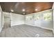 Bonus room with wood-look floors and recessed lighting and exterior door at 1224 Martin Rd, Hickory Grove, SC 29717