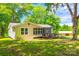 Charming home featuring a well-manicured lawn and welcoming wooden ramp for accessibility at 1224 Martin Rd, Hickory Grove, SC 29717