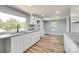 Bright kitchen with granite countertops, new cabinets, and a stainless steel sink at 1224 Martin Rd, Hickory Grove, SC 29717