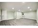 Bright living room with recessed lighting and stylish gray flooring, perfect for comfort at 1224 Martin Rd, Hickory Grove, SC 29717