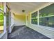 Covered porch offering natural light and ample space to relax or entertain guests at 1224 Martin Rd, Hickory Grove, SC 29717