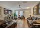 Inviting living room featuring hardwood floors, stylish seating, and sophisticated decor at 1225 Assembly St, Belmont, NC 28012