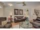 Inviting living room with hardwood floors, leather sofas, and stylish decor creates a cozy atmosphere at 1225 Assembly St, Belmont, NC 28012