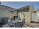 Outdoor patio area featuring a table, chairs, grill, and stylish lighting at 1225 Assembly St, Belmont, NC 28012