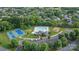 Community clubhouse with pool, tennis courts, playground, parking and green space at 1310 Bellhook Nw Pl, Concord, NC 28027