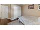 Comfortable bedroom with a cozy bed, closet and artwork at 1310 Bellhook Nw Pl, Concord, NC 28027