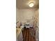 Bathroom with a toilet, vanity, and shower with patterned curtain at 140 Dalu Ln, Harmony, NC 28634