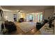Spacious living room with fireplace, plush seating, and charming decor at 140 Dalu Ln, Harmony, NC 28634