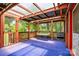 Inviting back porch features a covered roof, swing, and plenty of space for relaxing and entertaining outdoors at 141 Porter Rd, Statesville, NC 28625