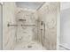 Clean and updated shower with marble tile and safety bars at 141 Porter Rd, Statesville, NC 28625