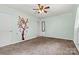 Bedroom with light green walls, carpet, and a ceiling fan at 141 Porter Rd, Statesville, NC 28625