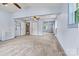Spacious bedroom with neutral carpet, ceiling fan, and natural light at 141 Porter Rd, Statesville, NC 28625