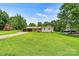 Expansive property with a well-cared-for lawn and traditional home design at 141 Porter Rd, Statesville, NC 28625