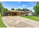 Charming single-story home with a covered carport and beautifully landscaped front yard at 141 Porter Rd, Statesville, NC 28625