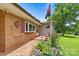 Charming front porch with lovely plants creating a welcoming entryway at 141 Porter Rd, Statesville, NC 28625