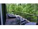 Spacious back deck featuring lounge chair, patio furniture and view of greenery at 1543 Withers Dr, Denver, NC 28037