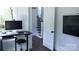 Home office area with modern computer and workspace, offering a practical space for work at 1543 Withers Dr, Denver, NC 28037