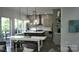 Modern kitchen with gray cabinets, white countertops, a central island and stainless steel appliances at 1543 Withers Dr, Denver, NC 28037
