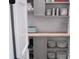 Organized pantry with gray cabinets and open shelving, perfect for storage at 1543 Withers Dr, Denver, NC 28037