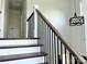 Interior staircase showing the railing and lighting, emphasizing the home's modern design at 1543 Withers Dr, Denver, NC 28037