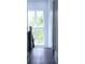 Bright staircase with large windows providing ample natural light and wood look flooring at 1543 Withers Dr, Denver, NC 28037