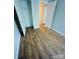Bedroom featuring wood-look flooring and a closet at 1624 Arlyn Cir # G, Charlotte, NC 28213
