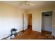 Comfortable bedroom with hardwood floors, neutral walls, and closet space at 170 Heritage Ln, Salisbury, NC 28147