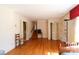 Spacious room featuring hardwood floors, bright natural light, neutral walls and direct staircase access at 170 Heritage Ln, Salisbury, NC 28147
