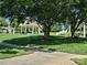 Two shaded gazebos with picnic tables are visible on a green lawn at 17119 Doe Valley Ct, Cornelius, NC 28031
