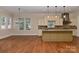 Bright kitchen with granite countertops, stainless steel appliances, and island at 17210 Sulky Plough Rd # 1206, Charlotte, NC 28277