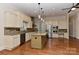Spacious kitchen with stainless steel appliances, granite countertops, and center island at 17210 Sulky Plough Rd # 1206, Charlotte, NC 28277