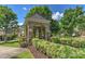 Charming park area, featuring a stone structure and manicured landscaping at 17210 Sulky Plough Rd # 1206, Charlotte, NC 28277