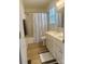 A full bath with double vanity, mirror, and shower-tub combo at 1743 Silver Stream Dr, Rock Hill, SC 29730