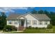 Charming single-story home with a well-manicured lawn and inviting front porch at 1743 Silver Stream Dr, Rock Hill, SC 29730