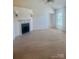 Spacious living room features a cozy fireplace and vaulted ceilings at 1743 Silver Stream Dr, Rock Hill, SC 29730