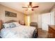 Bedroom with ceiling fan, wood bed frame, nightstand, and neutral walls at 1957 8Th Street Se Ln, Hickory, NC 28602