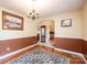 Dining room features hardwood floors, neutral tones, and is adjacent to the living room and kitchen at 1957 8Th Street Se Ln, Hickory, NC 28602